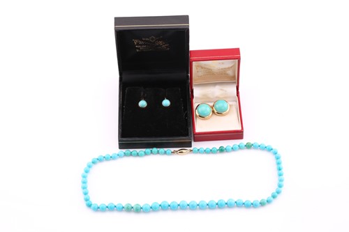 Lot 301 - A turquoise bead necklace, with yellow clasp;...