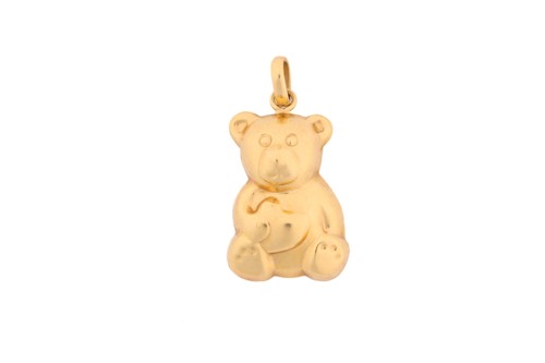 Lot 283 - A yellow metal teddy bear pendant, comprises a...