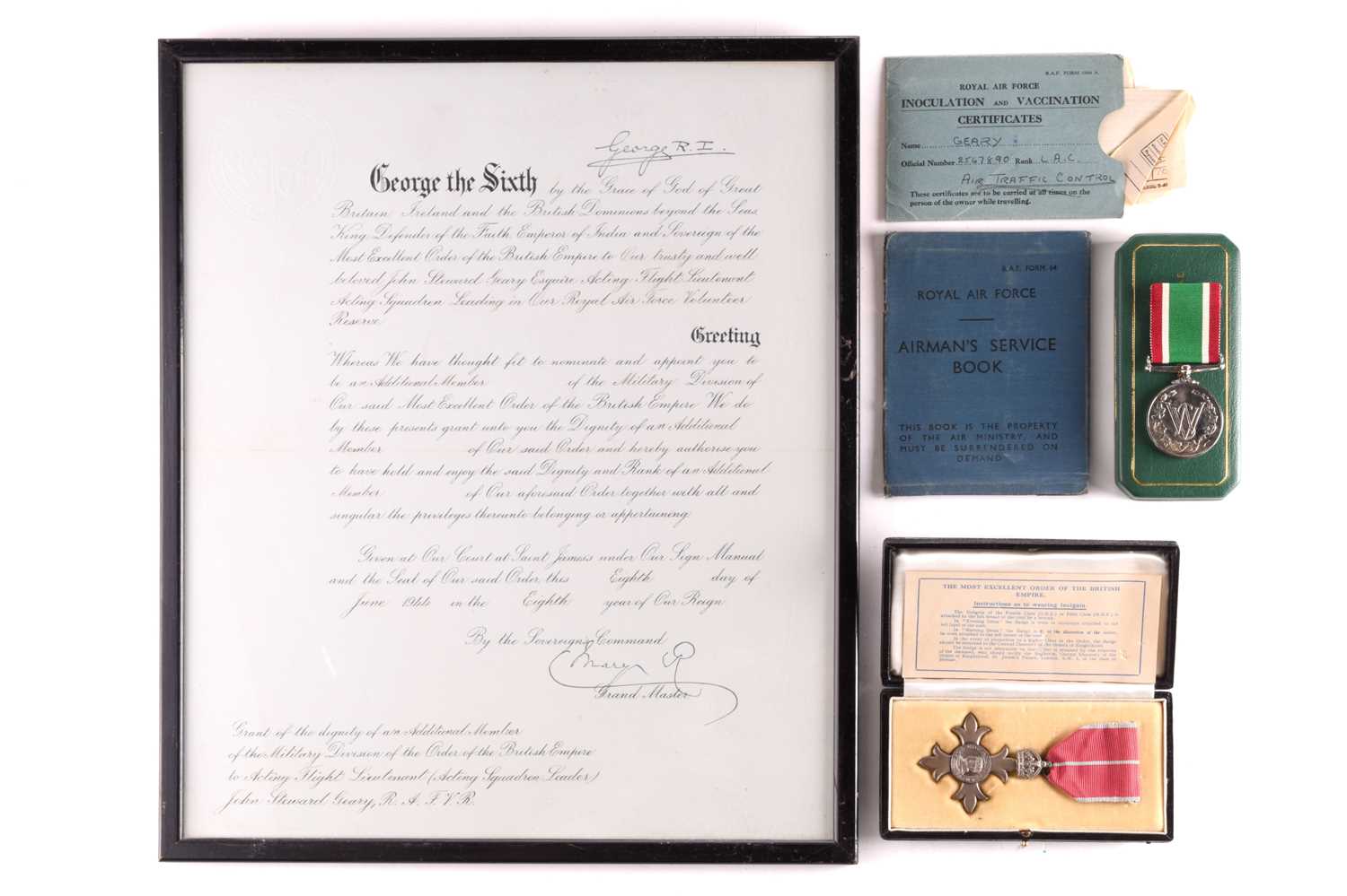 Lot 192 - A King George VI & Queen Mary signed OBE...