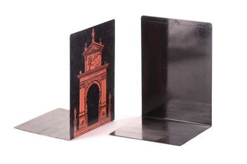 Lot 336 - A pair of Fornasetti metal bookends, 20 cm...