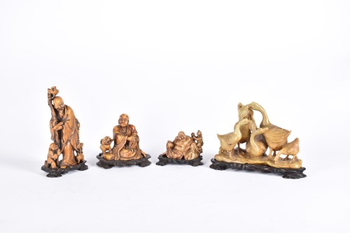 Lot 253 - Four Chinese soapstone carvings, late Qing to...