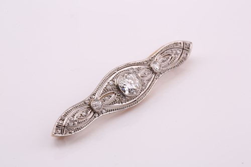 Lot 64 - A Belle Époque diamond bar brooch, comprises a...