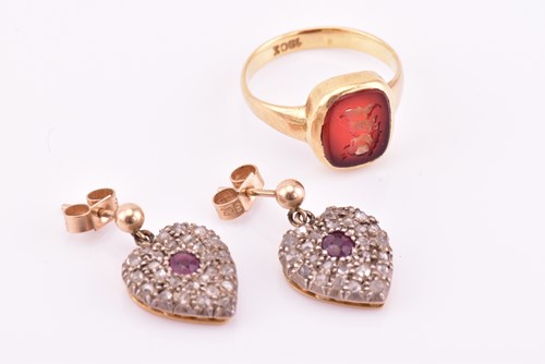 Lot 54 - A pair of diamond and ruby heart-shaped...