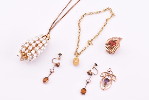 Lot 125 - A lot consists of miscellaneous pendants,...