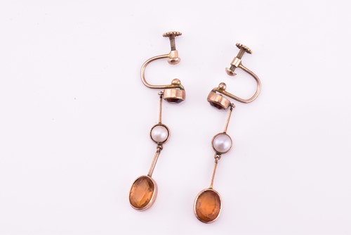 Lot 125 - A lot consists of miscellaneous pendants,...