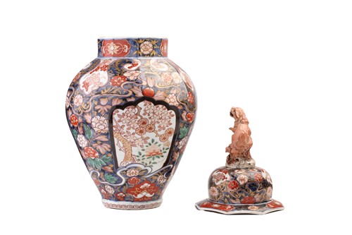 Lot 145 - A pair of Japanese Imari porcelain vases and...