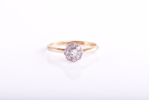 Lot 227 - An early 20th century nine stone diamond...