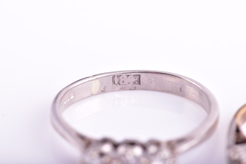 Lot 71 - A five stone half hoop diamond ring, the...