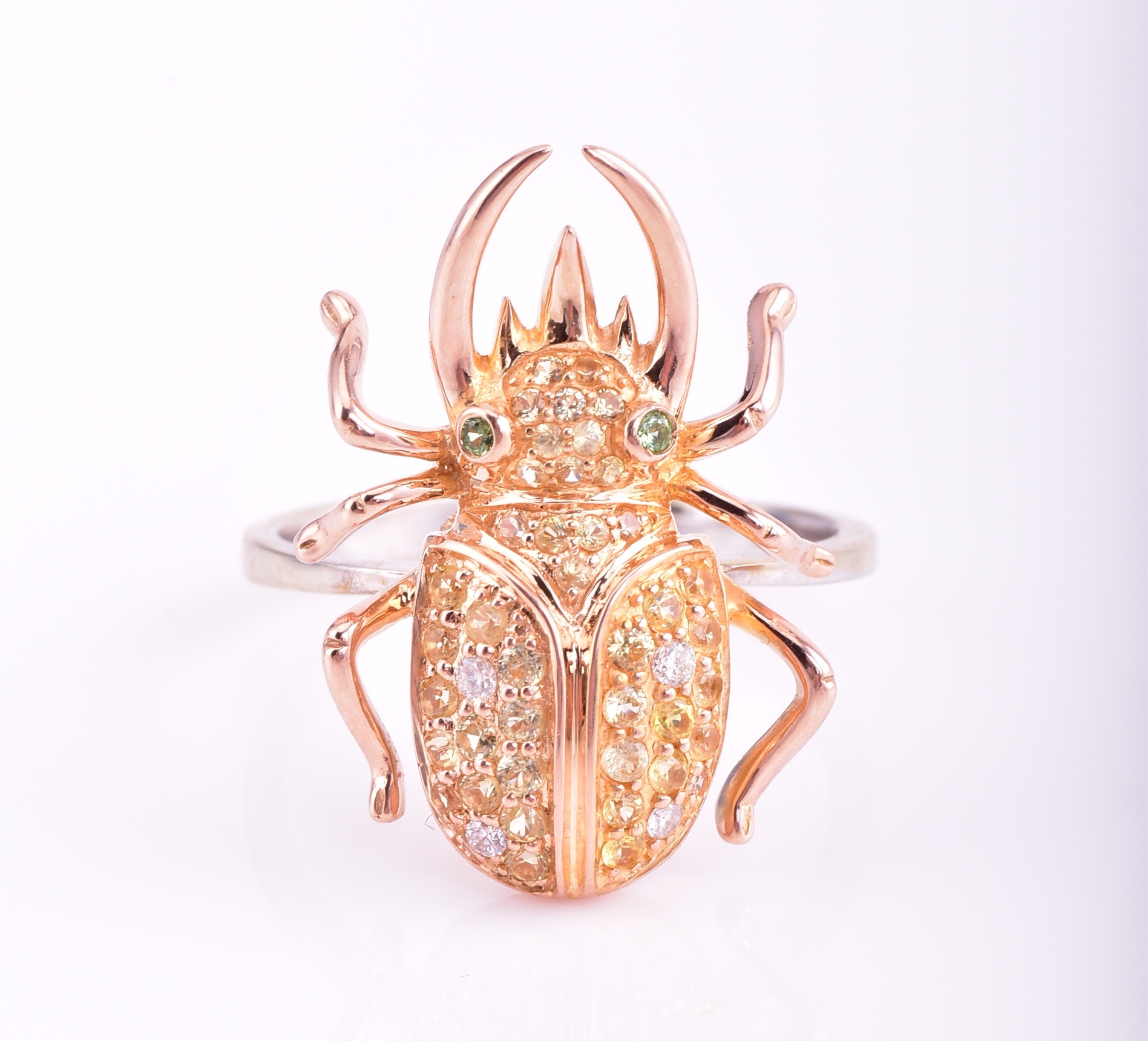 Beetle Shell Ring Lot 376 - A multi-gem set beetle ring; the 18 carat