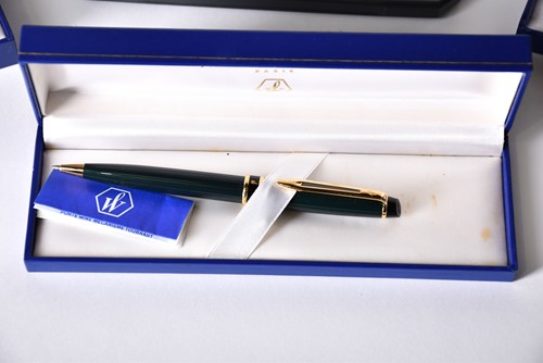 Lot 600 - A Waterman's black laquer rollerball pen with...