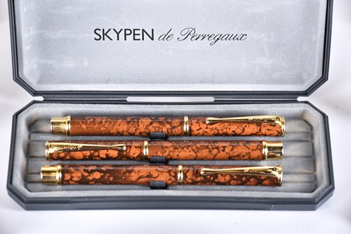 Lot 600 - A Waterman's black laquer rollerball pen with...