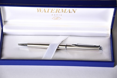 Lot 600 - A Waterman's black laquer rollerball pen with...