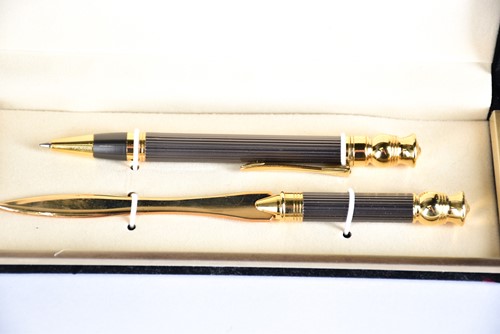 Lot 600 - A Waterman's black laquer rollerball pen with...