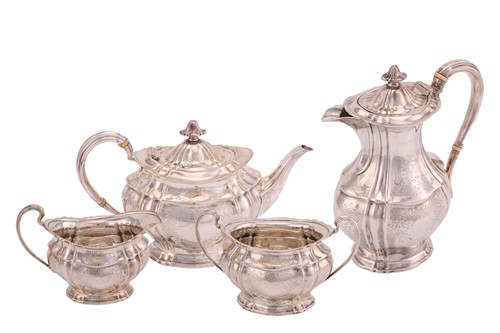 Lot 474 - A late Victorian silver four piece tea set; of...