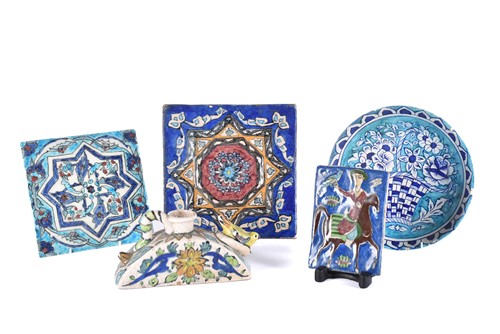 Lot 510 - A group of five Iznik-style items consists of...