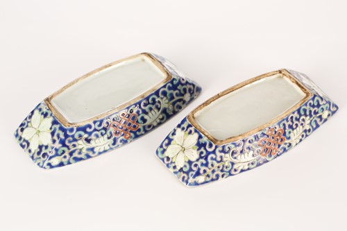 Lot 183 - A pair of Chinese porcelain cup holders, late...