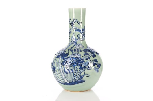 Lot 136 - A Chinese celadon tianqiuping vase, Qing,...