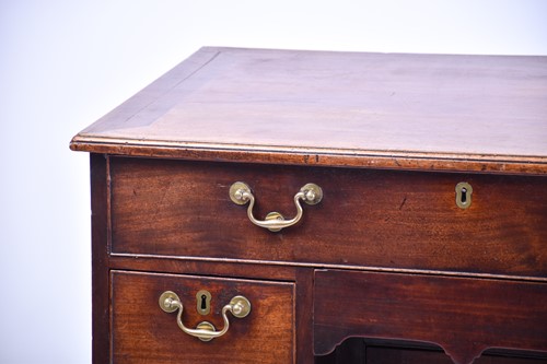 Lot 239 - A George III mahogany kneehole writing desk...