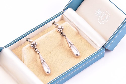 Lot 10 - Georg Jensen - a pair of drop earrings, with...