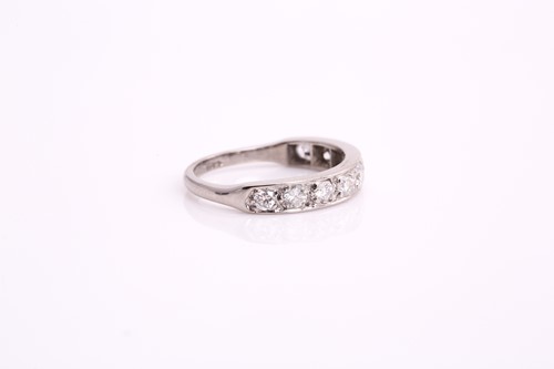 Lot 163 - An 18ct white gold diamond half eternity ring,...