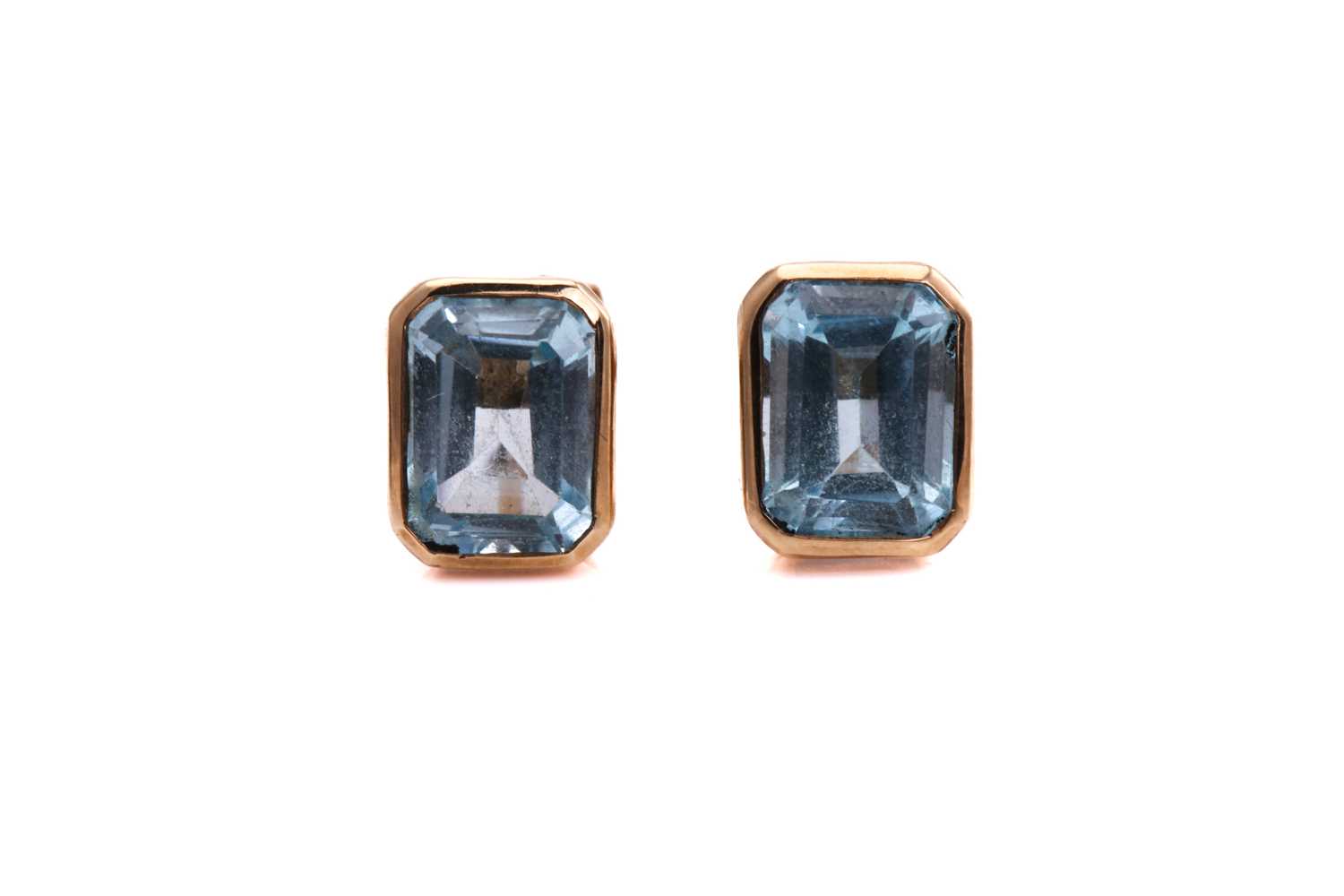 Lot 241 - A pair of 9ct gold topaz ear studs, each...