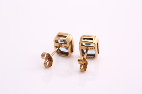 Lot 241 - A pair of 9ct gold topaz ear studs, each...