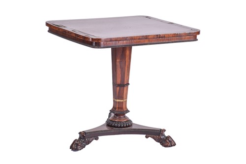 Lot 384 - A William IV rosewood and brass inlaid table,...