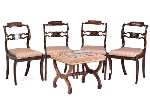 Lot 335 - A set of four Regency brass inlaid mahogany...