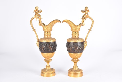 Lot 479 - A pair of renaissance revival bronze and fire...