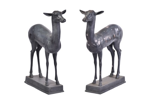 Lot 452 - A pair of Art Deco style patinated figures of...