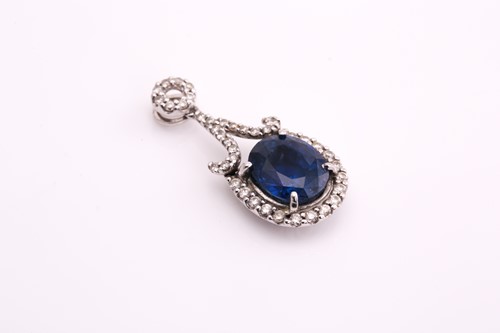 Lot 3 - A sapphire and diamond pendant, consisting of...
