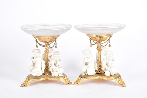 Lot 534 - A pair of gilt metal and moulded glass bonbon...