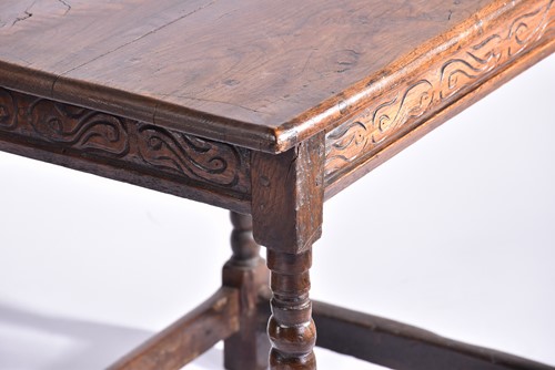 Lot 344 - An early 18th-century oak oval gateleg table...
