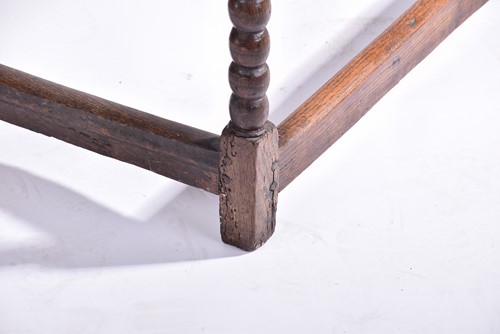 Lot 344 - An early 18th-century oak oval gateleg table...