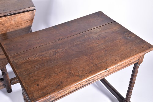Lot 344 - An early 18th-century oak oval gateleg table...