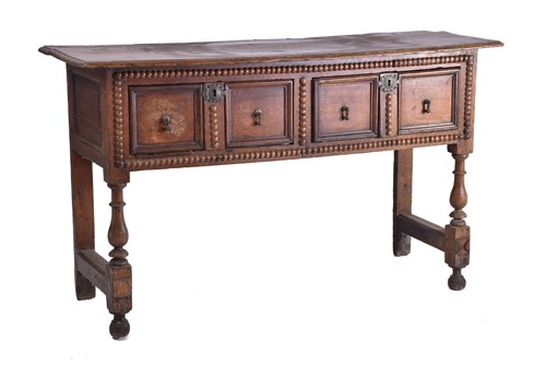 Lot 327 - A late 17th-century oak two drawer side table...