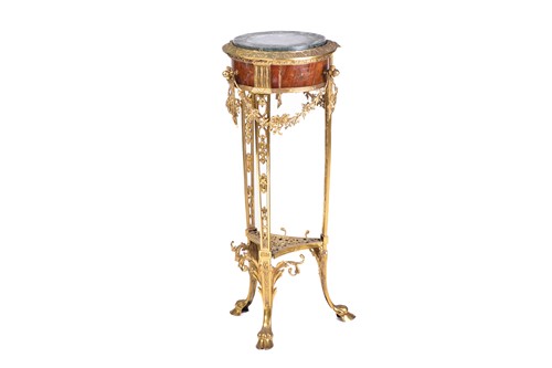 Lot 331 - A Louis XVI style marble-topped gilt bronze...