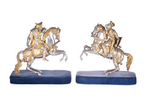 Lot 471 - A pair of parcel gilt and silvered metal...