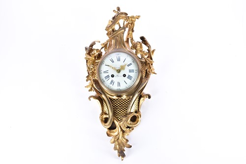 Lot 427 - A French gilt bronze cartel clock, late 19th...