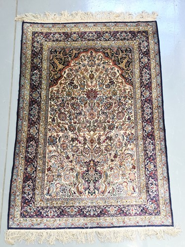 Lot 419 - A pair of ivory ground silk on silk Isfahan...