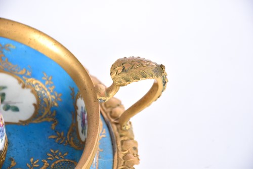 Lot 502 - A Sevres style porcelain and gilt metal...