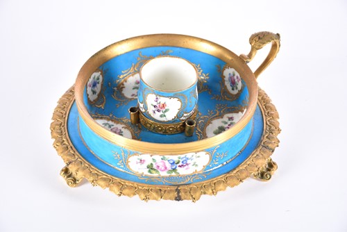 Lot 502 - A Sevres style porcelain and gilt metal...