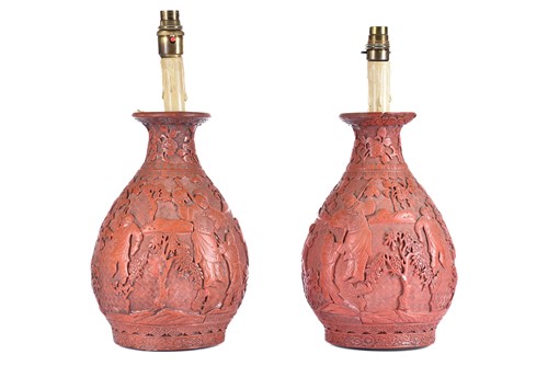 Lot 151 - A pair of Chinese cinnabar table lamps, 20th...