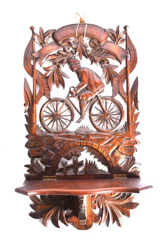 Lot 535 - A carved wood folding wall hanging shelf...