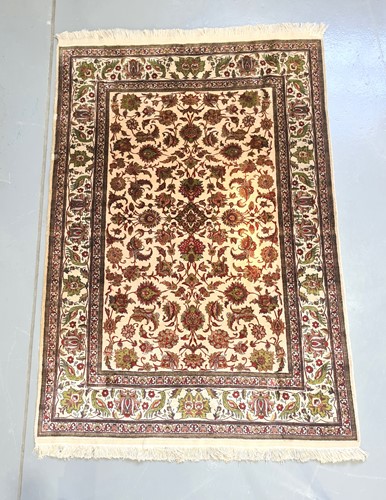 Lot 420 - An Indian (Kashmiri) ivory ground silk on silk...