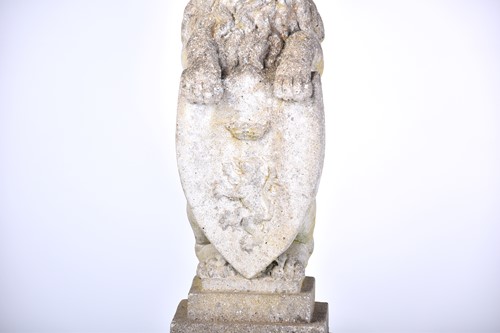 Lot 343 - A pair of cast stone figures of standing...