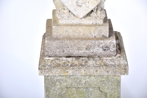 Lot 343 - A pair of cast stone figures of standing...