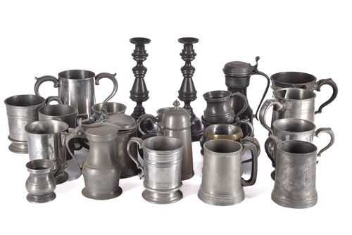 Lot 597 - A pair of pewter candlesticks and a large...