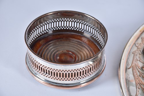 Lot 592 - An electrotype silver plate on copper charger,...