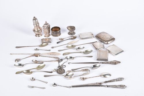 Lot 565 - A small collection of silver items to include...